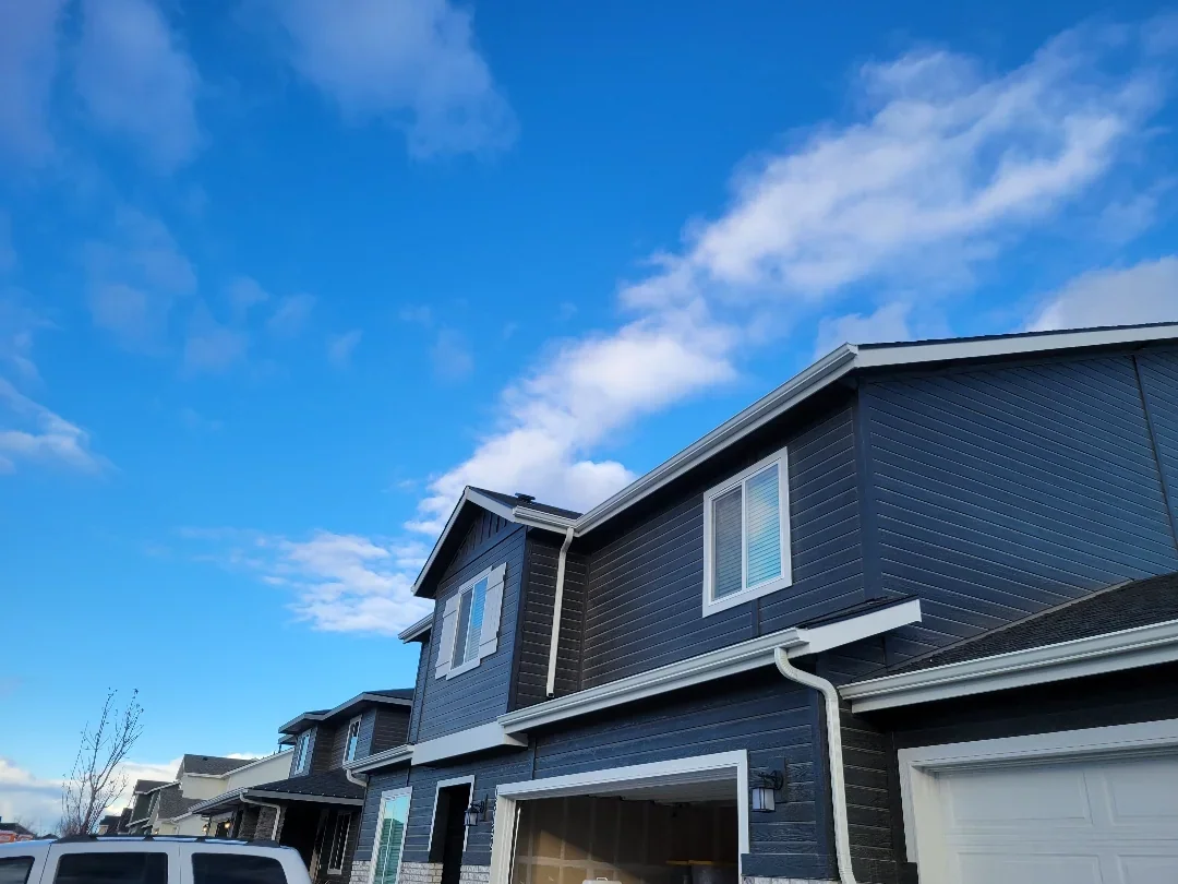 Front entry gutters and downspouts on a Brandon, FL home